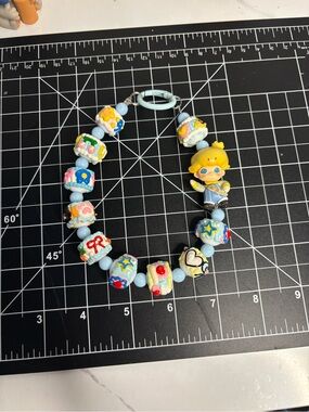 Kids Beaded Charm Necklace with Yellow Character and Light Blue Beads